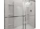 Modern white shower with glass door, providing a sleek and clean bathing space at 1515 Tamarisk Ln, Durham, NC 27703