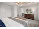 Bright bedroom with stylish decor, a tray ceiling, and plenty of natural light at 1517 Tamarisk Ln, Durham, NC 27703