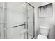 Modern glass-door shower with sleek fixtures at 1517 Tamarisk Ln, Durham, NC 27703