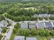 Aerial view of neighborhood with lush trees and landscaping at 1720 Laurel Park Pl, Cary, NC 27511