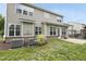 Backyard with well-maintained lawn and exterior view of the home at 1720 Laurel Park Pl, Cary, NC 27511