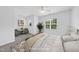 Bright bedroom features neutral decor, plush carpet, and lots of natural light at 1720 Laurel Park Pl, Cary, NC 27511