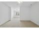 Bright bedroom with neutral carpet, ceiling fan and large windows offering natural light and open space at 1720 Laurel Park Pl, Cary, NC 27511