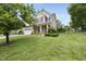 Charming home with well-manicured lawn and mature landscaping at 1720 Laurel Park Pl, Cary, NC 27511