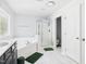 Bright bathroom with large soaking tub and separate glass shower at 1728 Callandale Ave, Cary, NC 27518