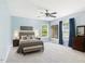 Bright bedroom with a plush carpet and ample natural light at 1728 Callandale Ave, Cary, NC 27518