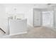 Neutral hallway on the 2nd floor of the home with access to rooms at 1728 Callandale Ave, Cary, NC 27518