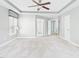 Large main bedroom with neutral carpeting and a view of ensuite bathroom at 1728 Callandale Ave, Cary, NC 27518