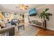 Bright living room with a ceiling fan, stylish furnishings, and hardwood flooring at 1905 Bivins St, Durham, NC 27707