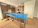 Spacious kitchen with a large island, stainless steel appliances, and stylish pendant lighting at 1995 Meadowview Dr, Graham, NC 27253