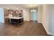 Bright kitchen with an island and wooden cabinets featuring new stainless steel appliances at 1998 Meadowview Dr, Graham, NC 27253