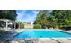 Community pool featuring blue water and well-maintained landscaping for relaxing at 204 Kirkwood Dr, Chapel Hill, NC 27514