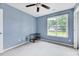 Bright bedroom featuring a large window offering natural light at 212 Spearhead Pl, Clayton, NC 27520