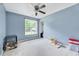 Bedroom featuring a ceiling fan and neutral carpet at 212 Spearhead Pl, Clayton, NC 27520