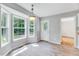 Cozy breakfast nook with tiled floor, ample natural light, and access to the backyard at 212 Spearhead Pl, Clayton, NC 27520