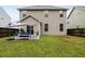 Spacious backyard featuring a well-maintained lawn and patio at 215 Outwater Ridge Dr, Garner, NC 27529