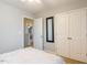 Bedroom featuring a double closet with view into the hallway at 215 Outwater Ridge Dr, Garner, NC 27529