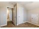 Bedroom featuring neutral walls, a ceiling fan, and a door into the hallway at 215 Outwater Ridge Dr, Garner, NC 27529