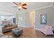 Open-concept layout showcasing the living room, kitchen, and staircase at 215 Outwater Ridge Dr, Garner, NC 27529