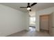Bright bedroom features a closet and a large window offering natural light at 2226 Gathering Sq Ct, Fuquay Varina, NC 27526