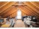 Spacious attic with exposed rafters and wooden flooring at 227 Paraggi Ct, Clayton, NC 27527