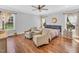 Spacious main bedroom features hardwood floors, sitting area, and large windows at 227 Paraggi Ct, Clayton, NC 27527