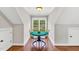 Cozy nook featuring a round table with chairs and a window offering a peaceful view at 227 Paraggi Ct, Clayton, NC 27527