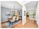 Elegant dining room featuring hardwood floors and gray walls at 2305 Bryarton Woods Dr, Raleigh, NC 27606