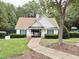 Charming pool house with manicured landscaping, offering a cool retreat for community swimmers at 2305 Bryarton Woods Dr, Raleigh, NC 27606