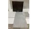 Display of countertop, dark cabinet door, stone flooring tile and mosaic wall tile at 256 Meadowbark Bnd # 45, Garner, NC 27529