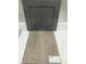 Flooring sample board shows Shaw Luxury Vinyl Plank flooring in Heardsville Plus and a Bellin cabinet in Greyhound at 264 Meadowbark Bnd # 43, Garner, NC 27529