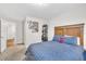 Bedroom featuring carpet, comfortable bed, and access to ensuite bath at 2721 Jazzy St, New Hill, NC 27562