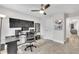 A bedroom converted into a music recording room featuring a ceiling fan and sound-dampening panels on the walls at 2721 Jazzy St, New Hill, NC 27562