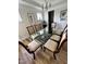 Bright dining area featuring seating for eight and natural light at 2721 Jazzy St, New Hill, NC 27562