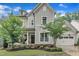 Beautiful two-story home with a manicured lawn, stone accents and an attached garage at 2721 Jazzy St, New Hill, NC 27562