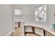 Bright hallway with elegant trim work and a unique window design at 2721 Jazzy St, New Hill, NC 27562