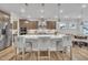 Spacious kitchen with stainless appliances, light countertops, and large center island at 2721 Jazzy St, New Hill, NC 27562