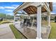 Community pavilion with rocking chairs and an open-air design at 2721 Jazzy St, New Hill, NC 27562