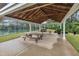 Covered pavilion with picnic tables and a view of tennis courts at 2721 Jazzy St, New Hill, NC 27562