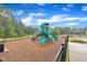 Community playground with slides, climbing structures, and safety surfacing at 2721 Jazzy St, New Hill, NC 27562