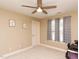 Bedroom featuring a ceiling fan, neutral walls, carpet, and a window with elegant curtains at 30 Cole Creek Way, Franklinton, NC 27525