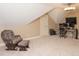 Bedroom featuring a ceiling fan, neutral walls, carpet, and a chair with an ottoman at 30 Cole Creek Way, Franklinton, NC 27525