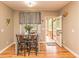 Cozy dining area with modern table set and outdoor view at 30 Cole Creek Way, Franklinton, NC 27525