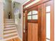 Welcoming front foyer with hardwood floors and staircase at 30 Cole Creek Way, Franklinton, NC 27525