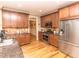 Kitchen featuring stainless steel appliances, granite countertops and wooden cabinets at 30 Cole Creek Way, Franklinton, NC 27525