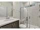 Modern bathroom featuring a glass-enclosed shower, and stylish vanity with elegant fixtures at 304 Ford Meadows Dr, Garner, NC 27529