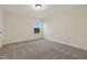 Cozy bedroom with neutral carpet and ample natural light at 304 Ford Meadows Dr, Garner, NC 27529