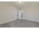 This carpeted bedroom has neutral walls and double door closets at 304 Ford Meadows Dr, Garner, NC 27529
