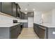 Spacious kitchen with modern appliances, a large island, and convenient bar seating at 304 Ford Meadows Dr, Garner, NC 27529