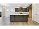 Contemporary kitchen boasting a large island, sleek cabinetry, and recessed lighting at 304 Ford Meadows Dr, Garner, NC 27529